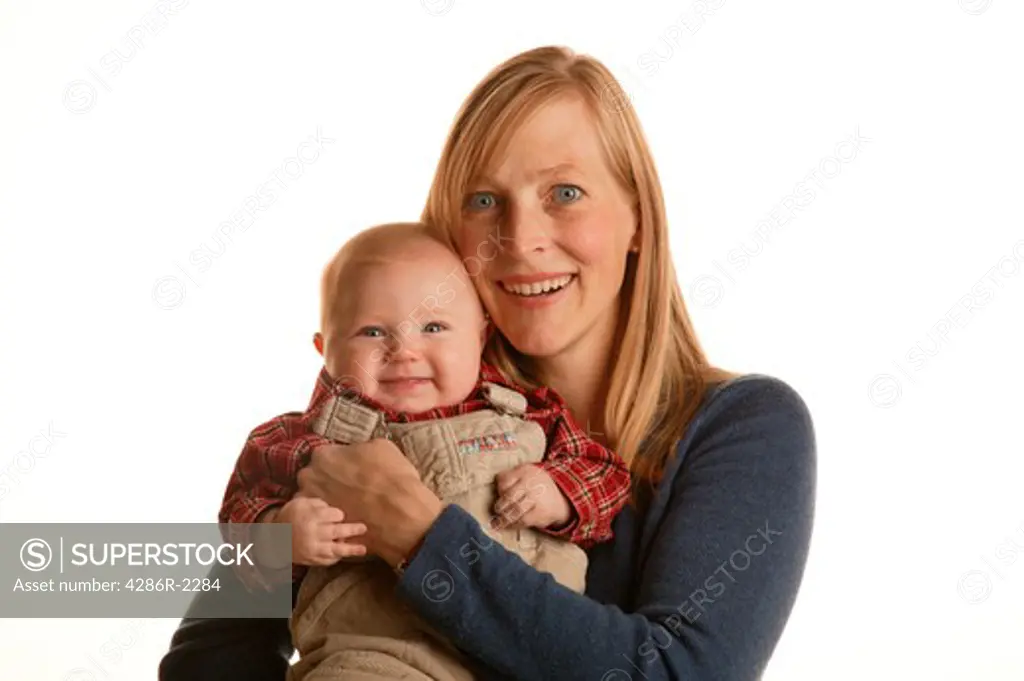 Studio shot of a mother holding her baby.