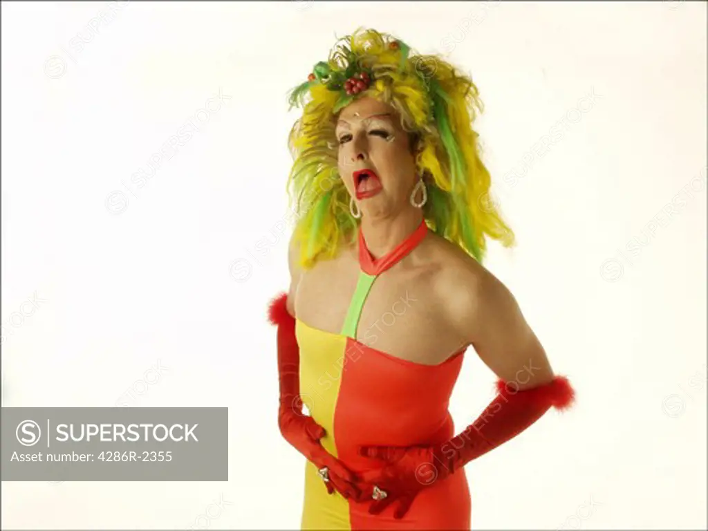 Sassy transvestite in yellow and orange tube dress