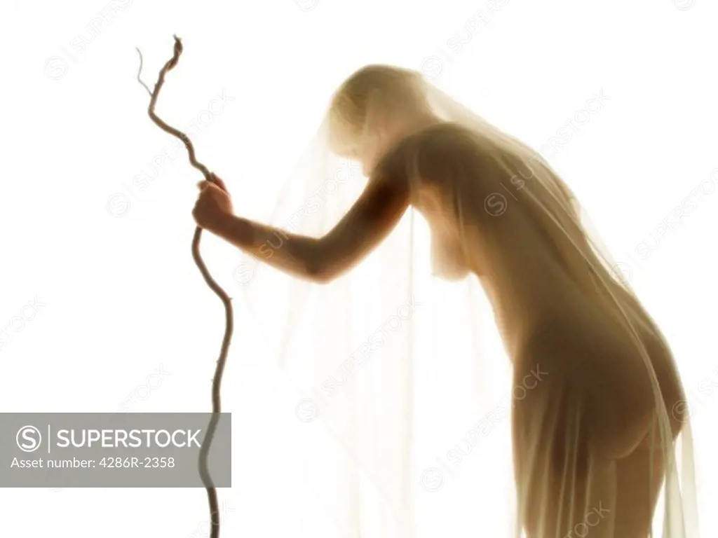 Veiled nude with curved staff