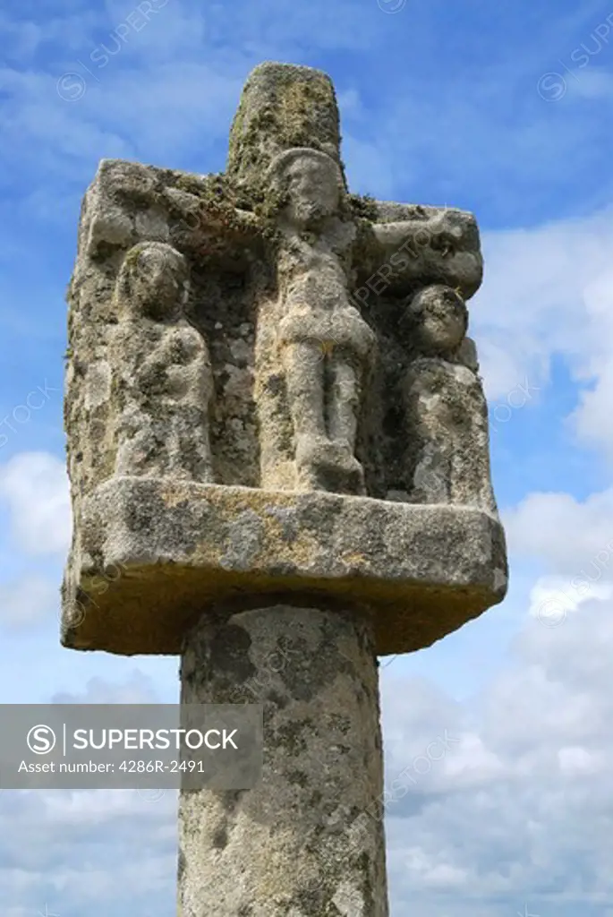 Breton stone cross near Tumulus Saint-Michel church in Carnac, South Brittany, France