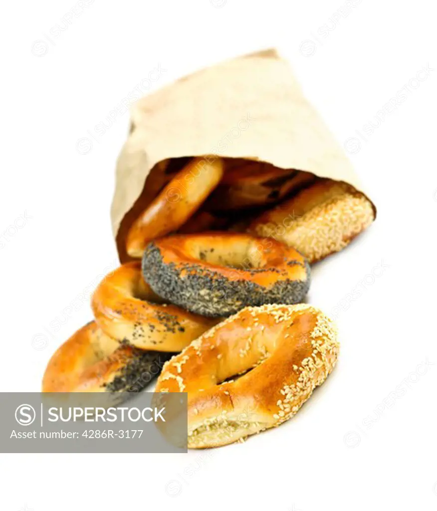 Fresh Montreal style bagels in paper bag on white background