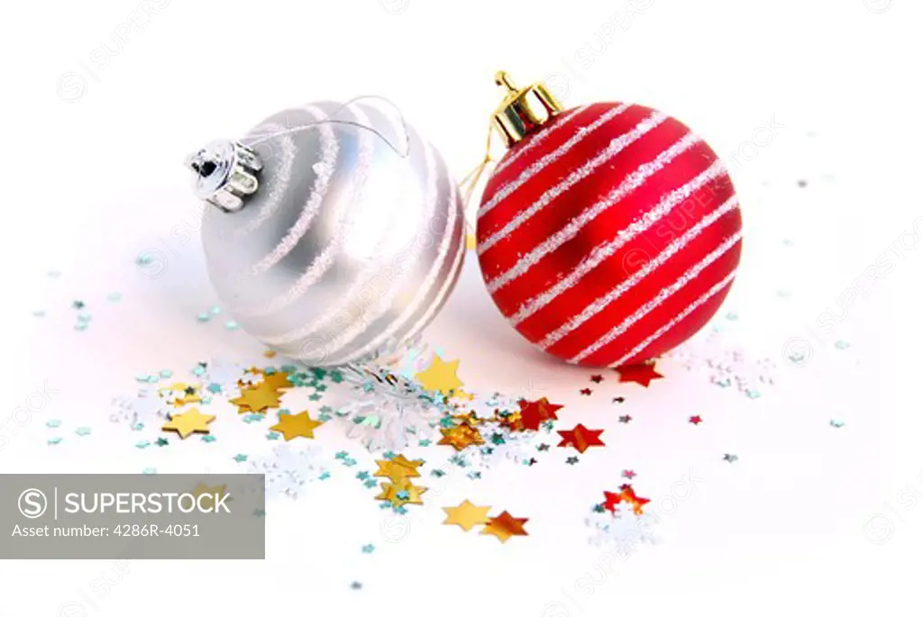 Two christmas glass balls on white background