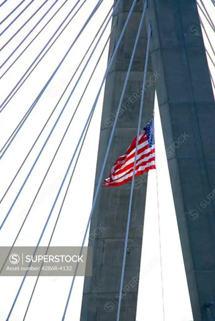 Detail of Leonard Zakim bridge in Boston with american flag