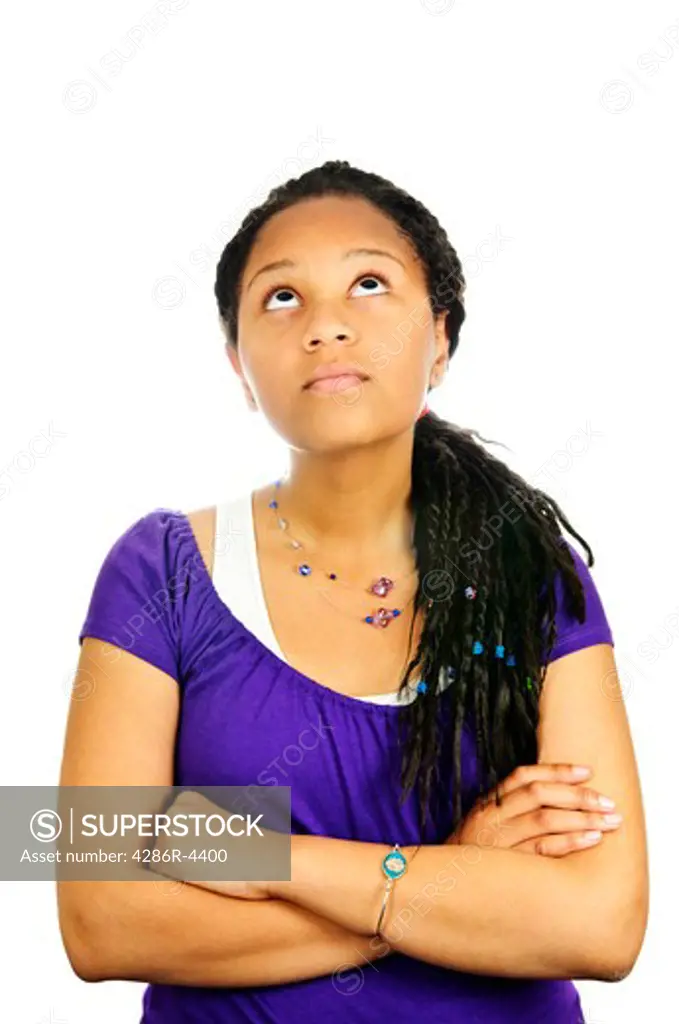 Isolated portrait of  black teenage girl with arms crossed