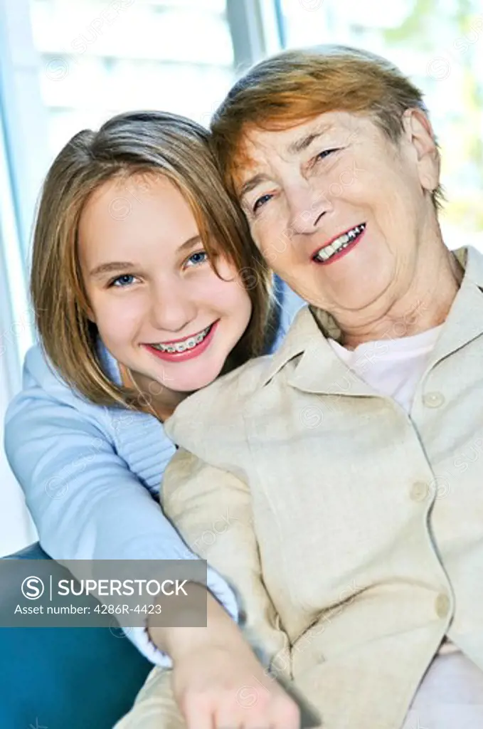 Granddaughter giving a hug to her grandmother