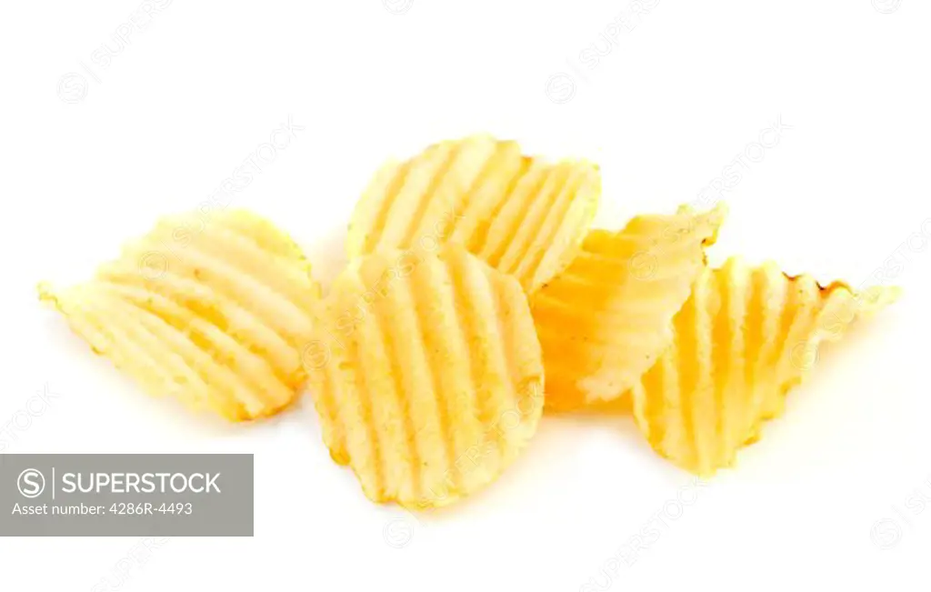Several potato chips isolated on white background