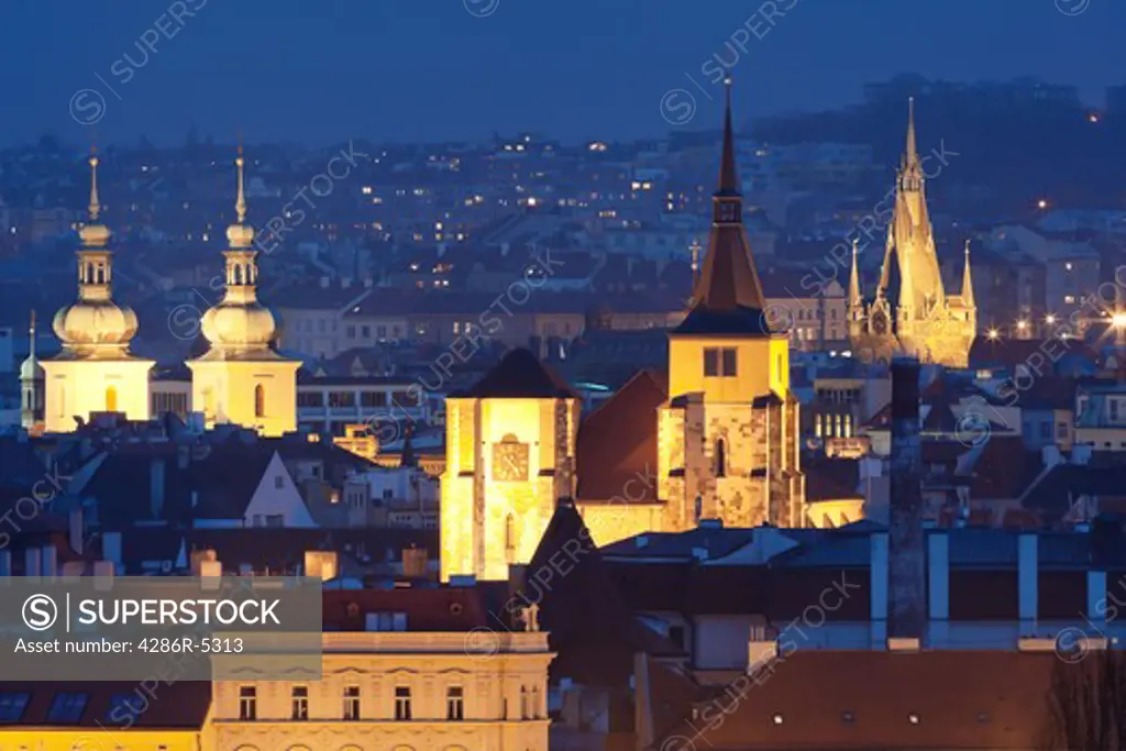 czech republic, prague - spires of churches of the old town at dusk