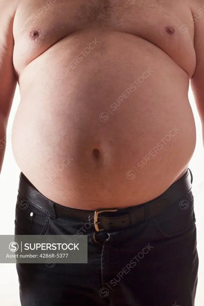 big belly of a fat man isolated on white