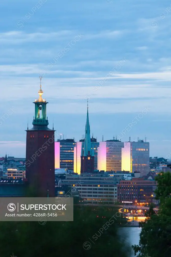 sweden stockholm - town hall and city highrises during long summer night