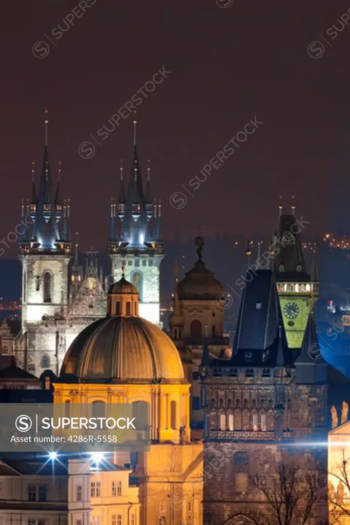czech republic, prague - spires of the old town and tyn church at dusk