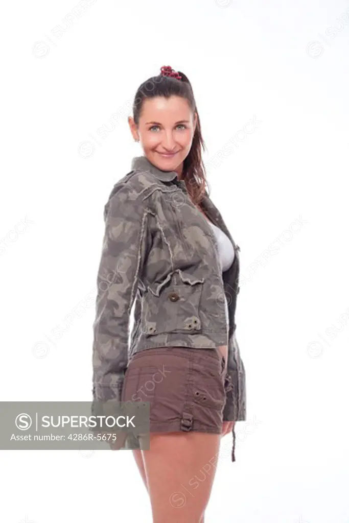 woman with brown hair in shorts and streetware jacket - isolated on white