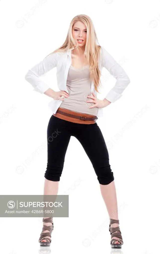 young woman with blond hair standing - isolated on white