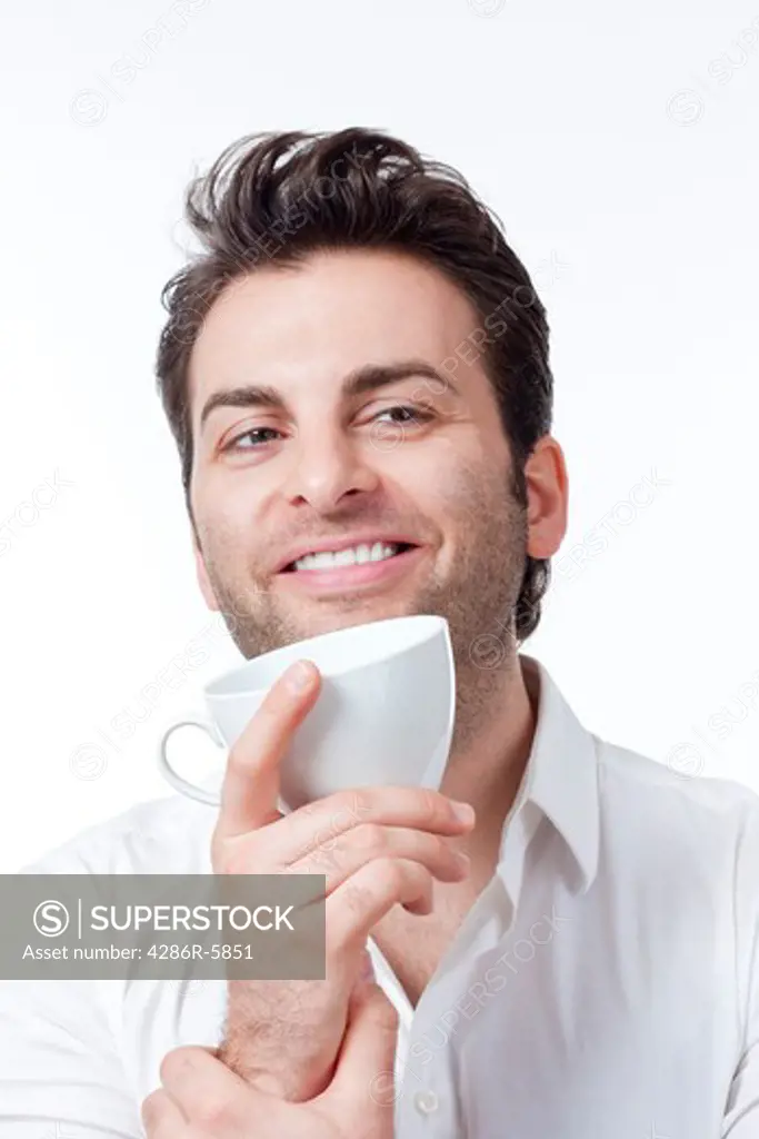 man in shirt holding cup of coffee smiling - isolated on white