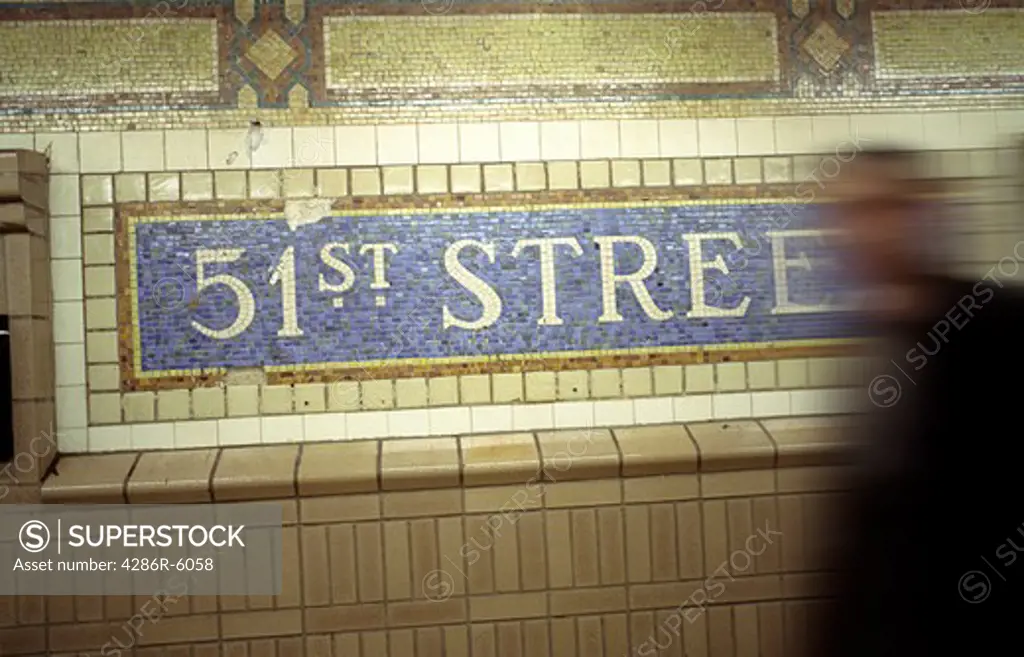 Mosiac tile sign in subway station at 51st street in New York City