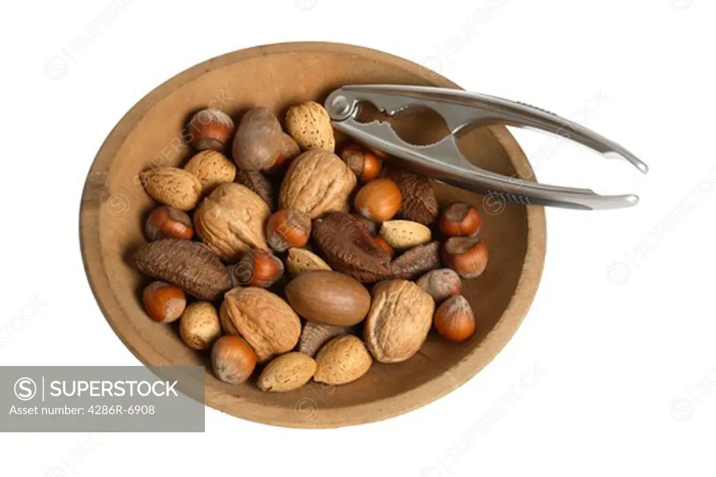Bowl of mixed nuts and nutcracker