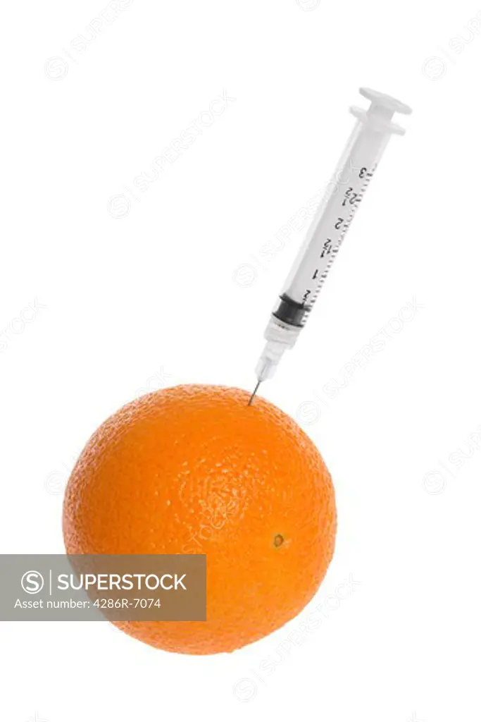 Orange with syringe