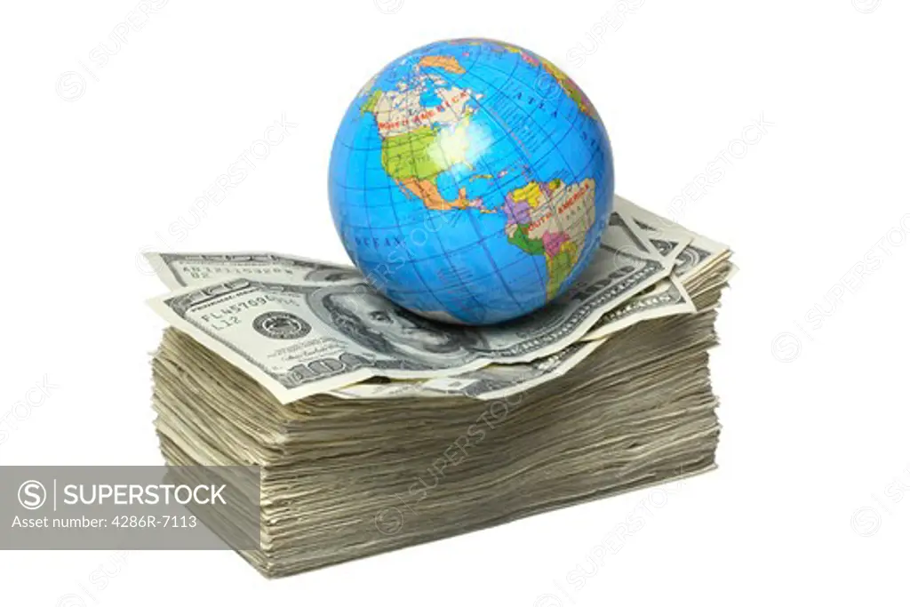 Globe on stack of money