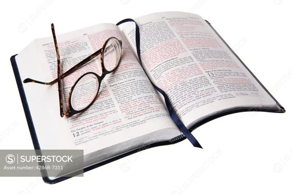 Bible and reading glasses