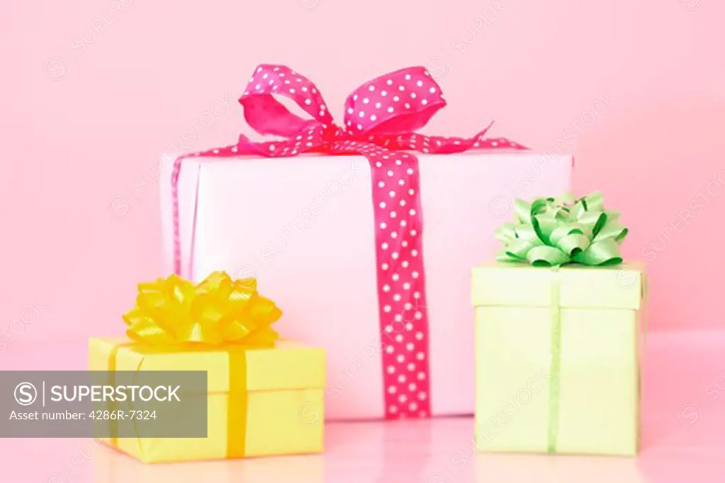 Group of presents with pink background