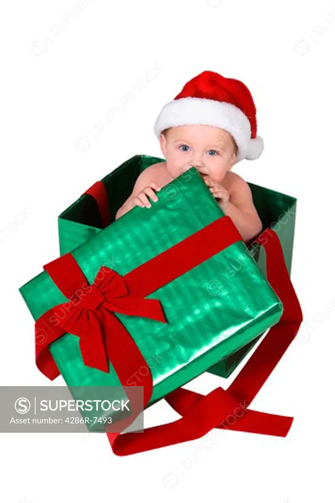 Baby in gift box with Santa hat