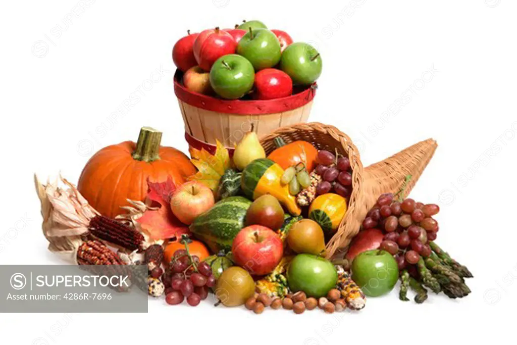 Pumpkin, basket of apples and cornucopia of fruits and vegetables