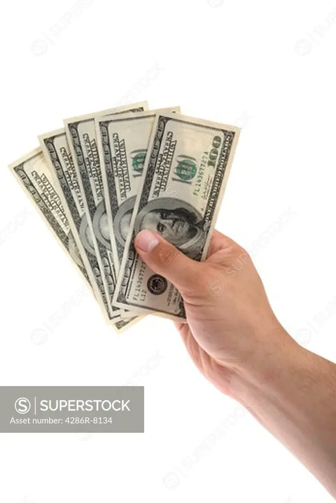 Hand holding money