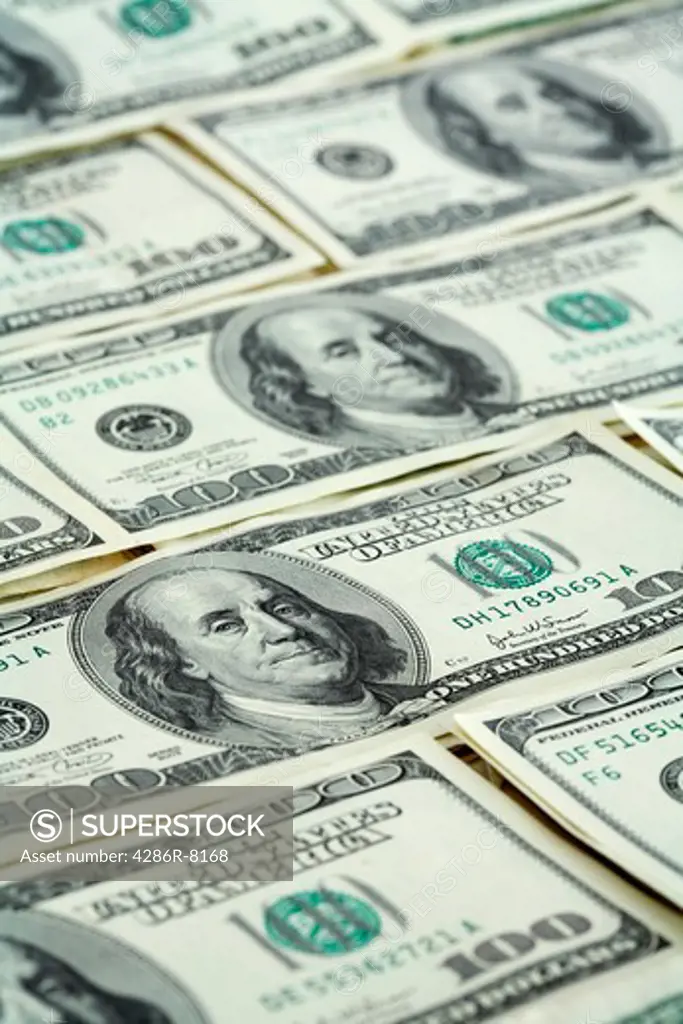 Background texture of one hundred dollar US bills