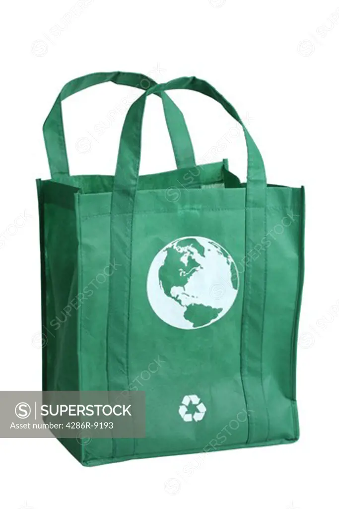 Green reusable shopping bag, cut out on white background