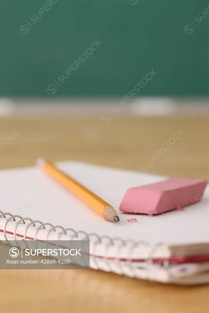 School education still life of pencil and eraser on notebook