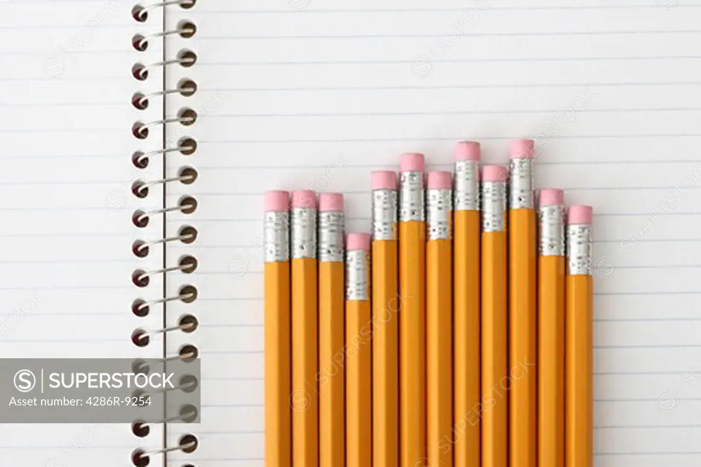 School education still life, pencils on notebook