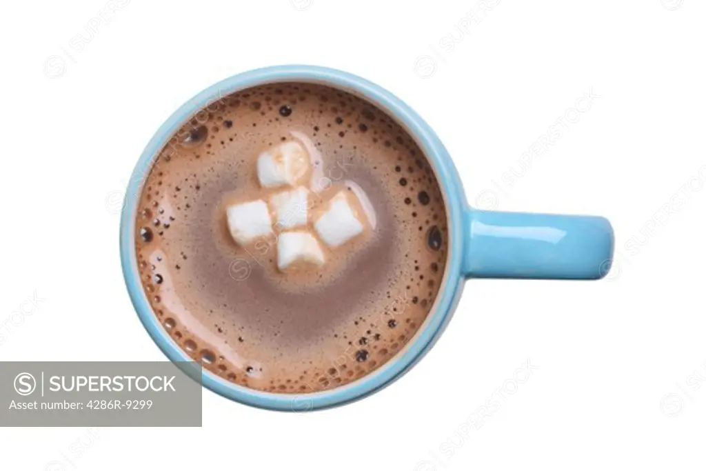 Overhead view of a mug of hot cocoa with marshmallows cutout, isolated on white background