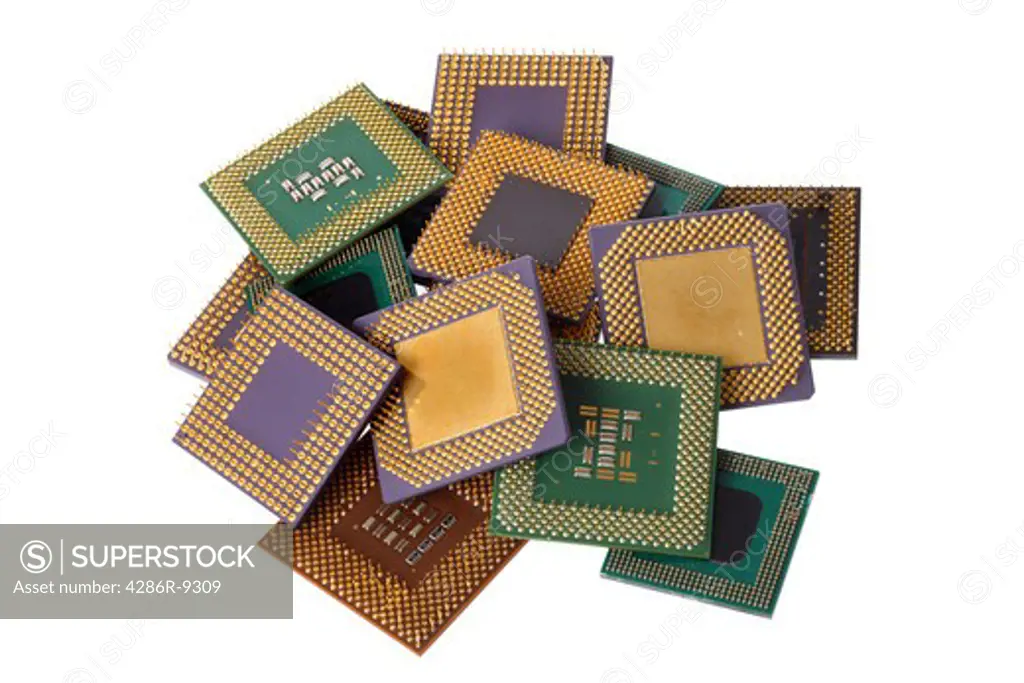 Pile of computer processor chips cut out on white background