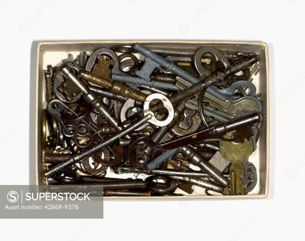 Still life close up of a box of keys.