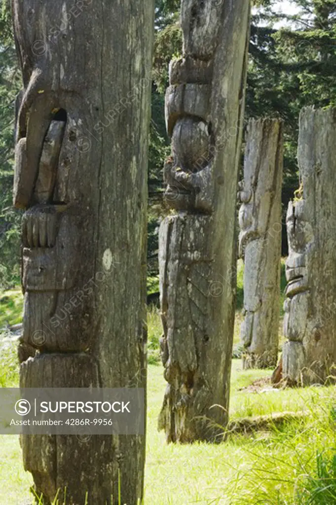 Gwaii Haanas National Park Reserve, Queen Charlotte Islands. SGANG GWAAY World Heritage Site. (Anthony Island, Ninstints). Ancient totems and village site. British Columbia Canada  -