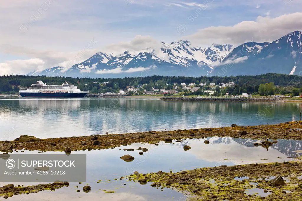 View from Portage Cove of Haines and Ft. Seward with a cruise ship docked in the harbor, Southeast Alaska, Summer