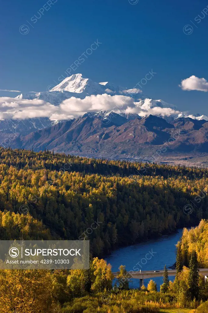 Afternoon light on Mount McKinley and the Alaska Range with the Chulitna River in the foreground near the Parks Highway, Denali State Park, Southcentr...
