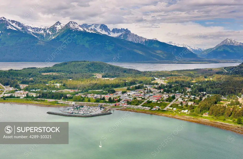 Aerial view of the city of Haines from above Chilkoot Inlet, Chilkat Mountain Range in the background, Southeast Alaska, Summer