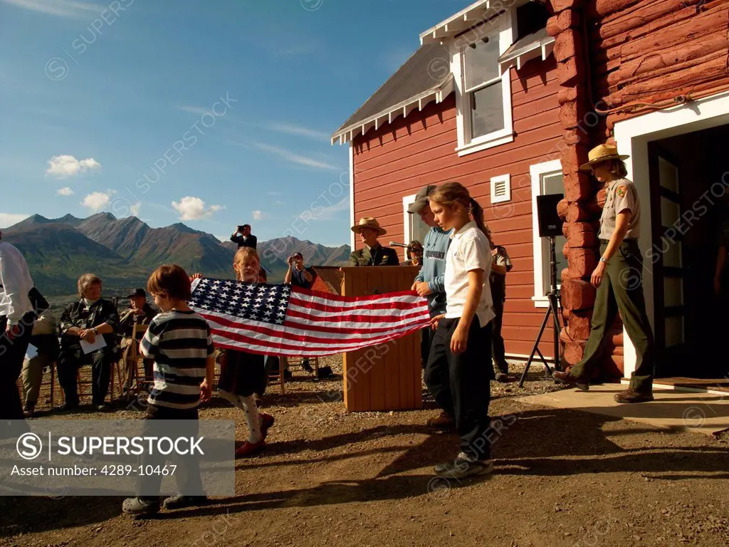 Flag raising at the Grand Opening ribbon cutting ceremony of the General Manager´s Office by the National Park Service, Kennicott Mine, Wrangell_St. E...