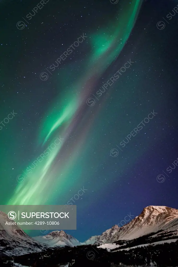 View of the Aurora Borealis over the Chugach Mountains, Anchorage, Southcentral Alaska, Fall