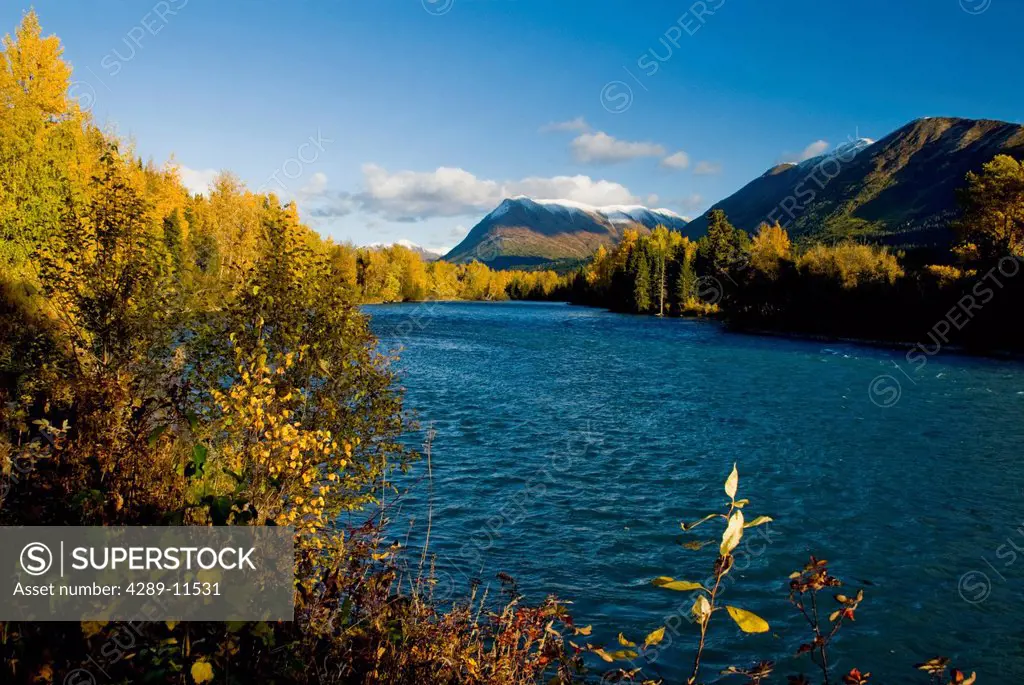 A view of the Kenai River and the Kenai Mountains with foliage at the peak of the color in the Chugach National Forest near Cooper Landing, Kenai Peni...