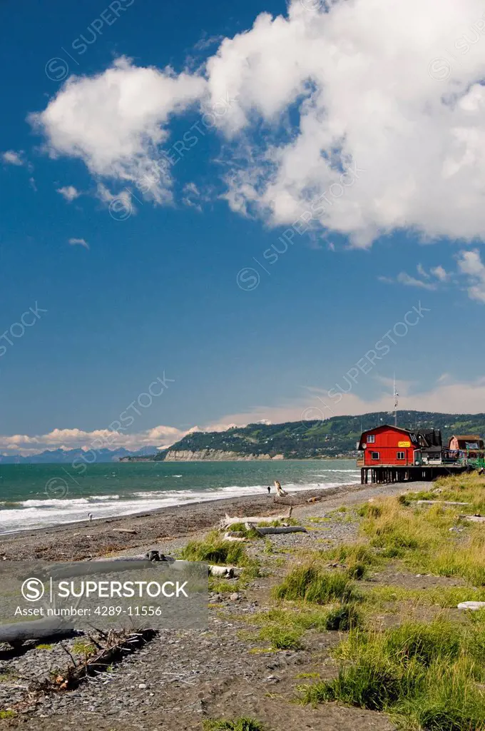Scenic view of Kachemak Bay and businesses along the Homer boardwalk and beach, Kenai Peninsula, Southcentral Alaska, Summer