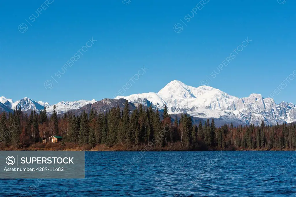 Scenic view of the southside of Mt. McKinley with Byers Lake in the foreground on a sunny day, Denali State Park, Southcentral Alaska, Autumn