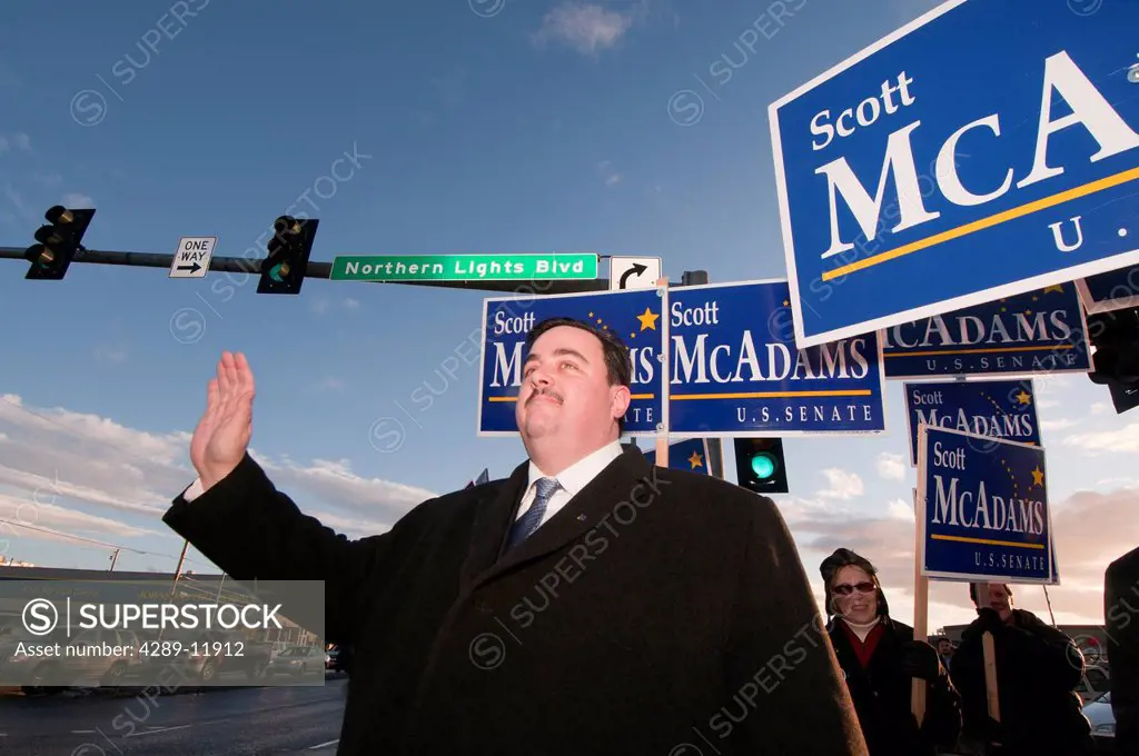 Democratic U.S. Senate candidate Scott McAdams is joined by supporters for some sign waving on the corner of Northern Lights Boulevard and Minnesota D...
