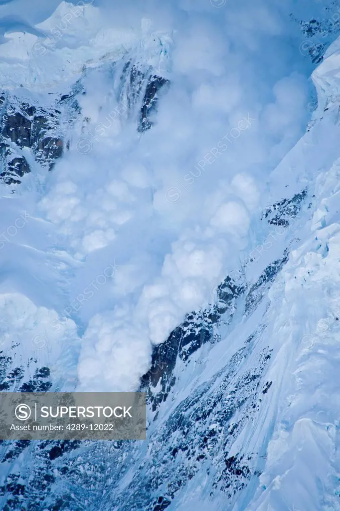 Billowing ice avalanche on the north side of Mount Hunter seen from Control Tower, Kahiltna Glacier, Alaska Range, Summer in Interior Alaska