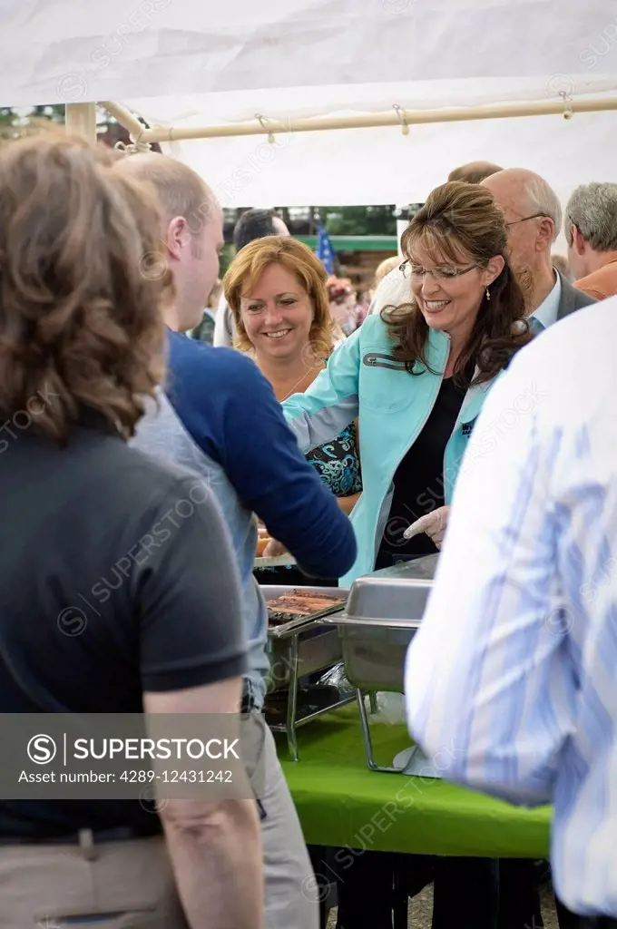 Alaska Governor Sarah Palin Hands Out Hotdogs At The Governor's Picnic In Fairbanks Before Her Resignation As Governor July 26, 2009