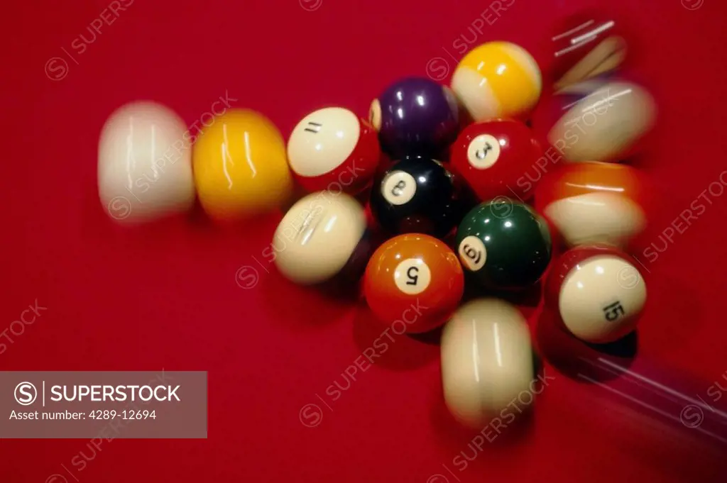 Closeup of Billiard Balls on red pool table blurred USA