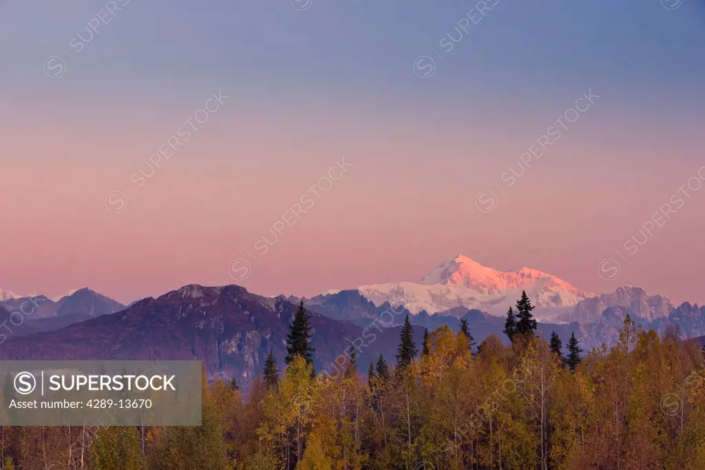 Panorama scenic of sunrise on Mt. McKinley and the Alaska Range as seen from the Veterans Memorial in Denali State Park, Southcentral Alaska, Autumn