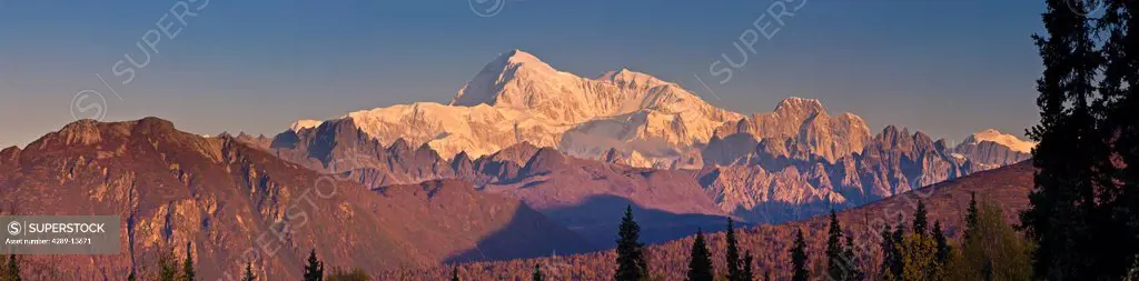 Panorama scenic of sunrise on Mt. McKinley and the Alaska Range as seen from the Veterans Memorial in Denali State Park, Southcentral Alaska, Autumn