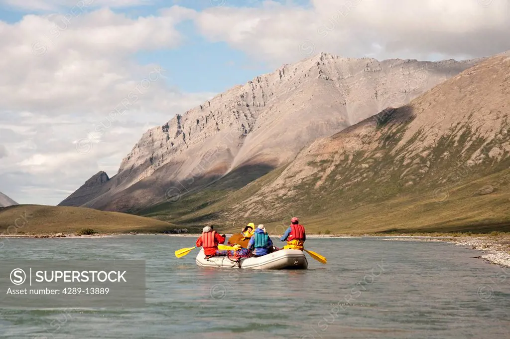 People rafting on the Marsh Fork of the Canning River in the Brooks Range, Arctic National Wildlife Refuge, Alaska, Summer