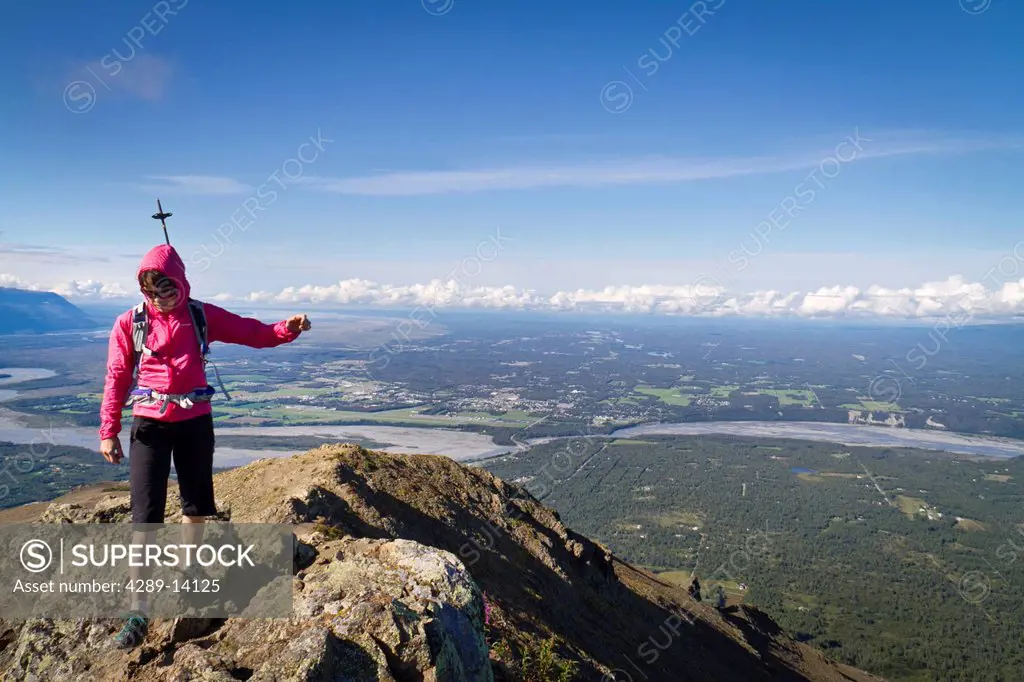 Female hiker on the summit of Lazy Mountain near Palmer, Chugach Mountains, Southcentral Alaska, Summer